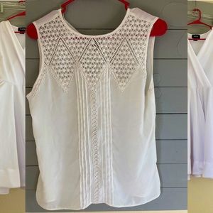 Express size petite small. In great condition.